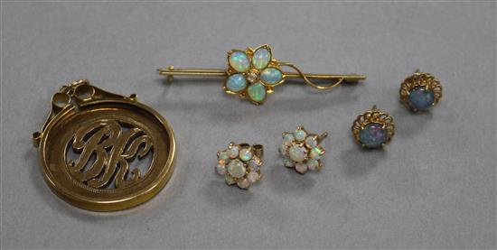 A 9ct gold and white opal bar brooch, a 9ct gold pendant and two pairs of ear studs.